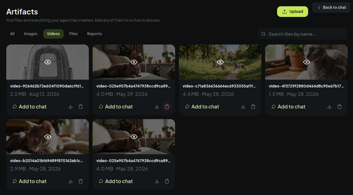 The artifacts library showing generated videos with an add-to-chat action